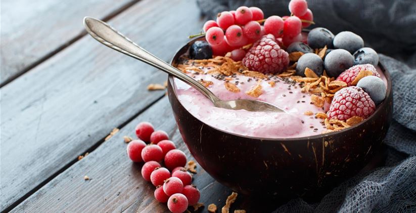 wild-berries-smoothie-bowls-topped-with-frozen-ber-USMPZ9B.jpg